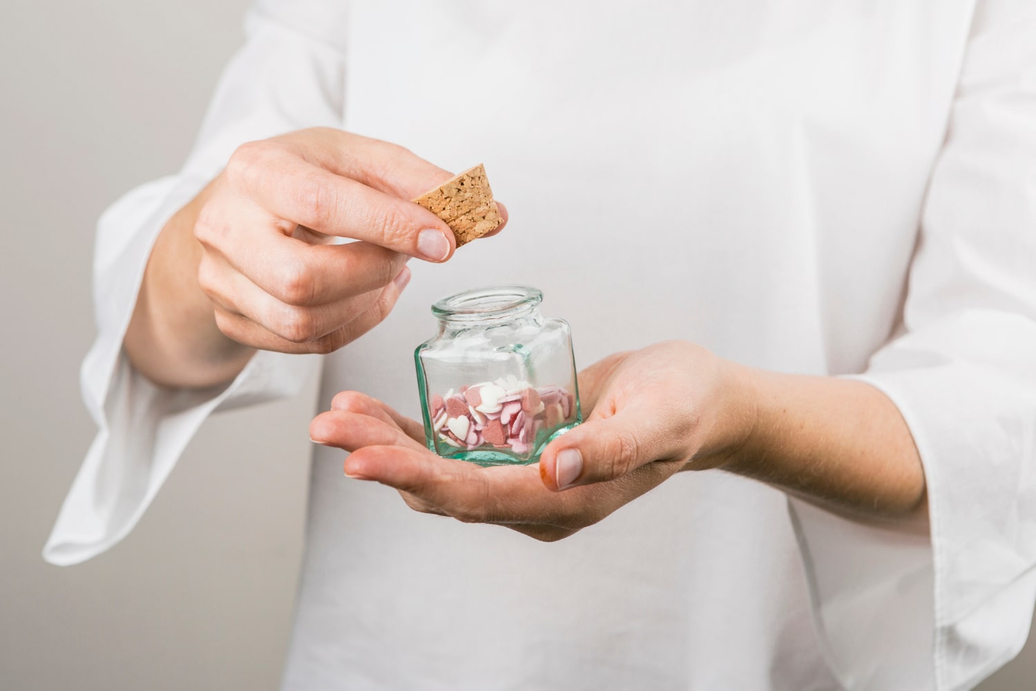 Handcrafted personalized jar gifts containing colorful paper stars