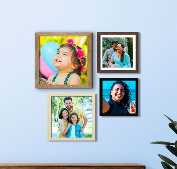 Stylish photo frame arrangement with family pictures in UAE living room.